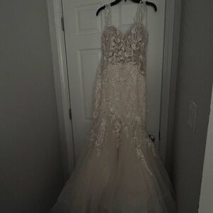 Wedding dress used for wedding needs to be cleaned used outdoor for pictures.